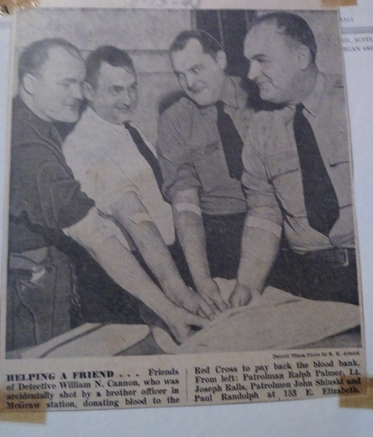 Detroit News photograph of Ralph Palmer and fellow officers at a blood bank benefit