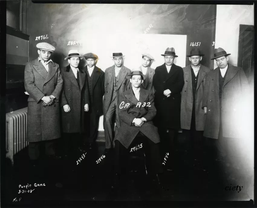 Nine men associated with Detroit police records, photographed in 1928