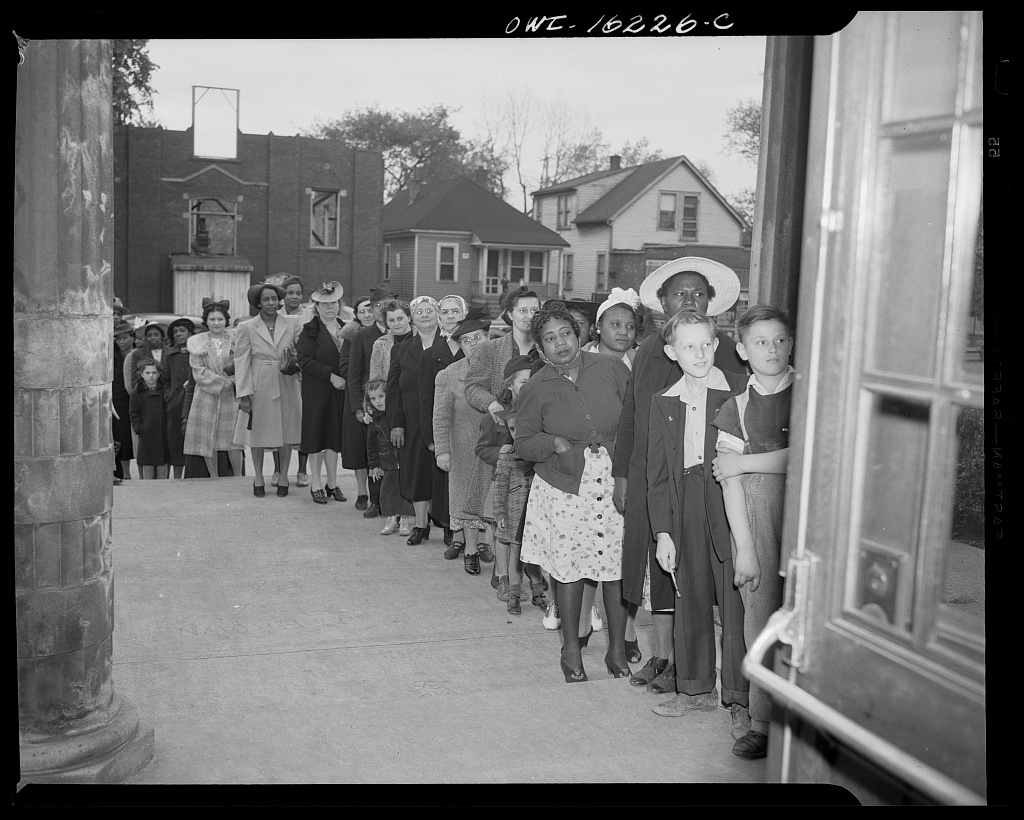 Detroit residents waiting at a sugar-rationing board in spring 1942