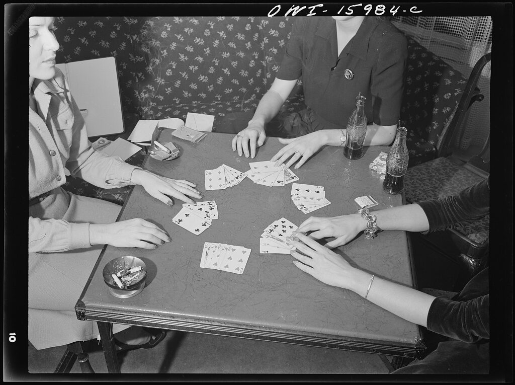 Detroit, Michigan. Poker hand and hands of girl players